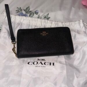 Coach black wallet never used.
